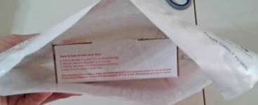 Box inside envelope
