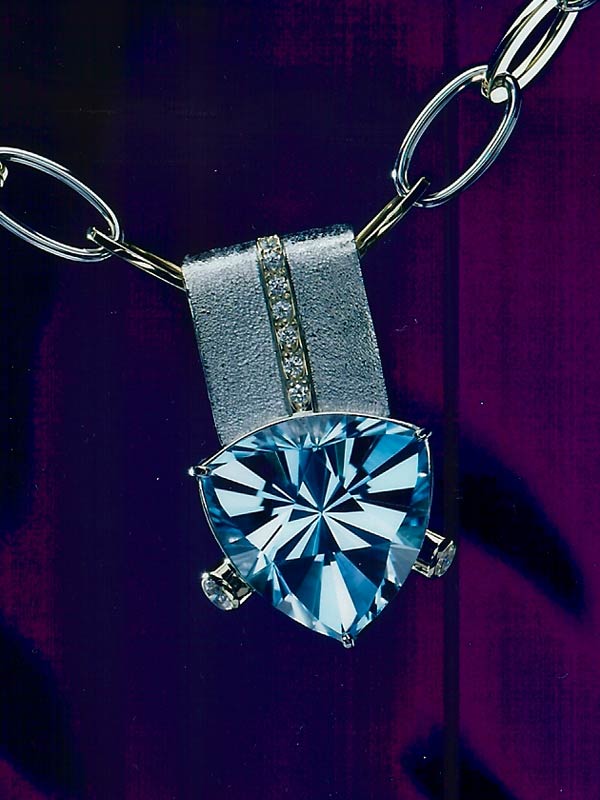 Pendant by Gary Dulac in White Gold and Diamonds Blue Topaz by John Dyer