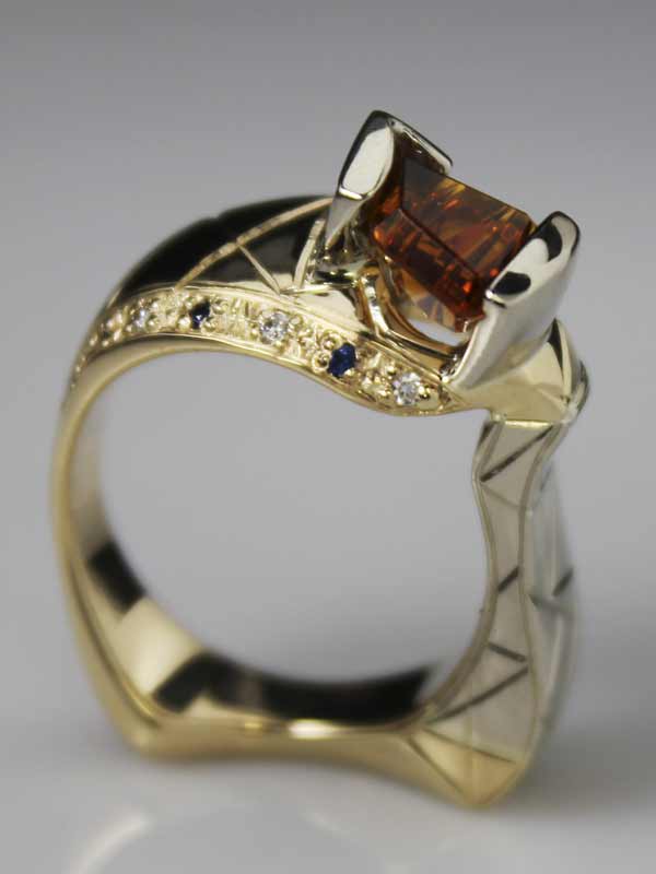 Award winning custom ring with Orange Tourmaline