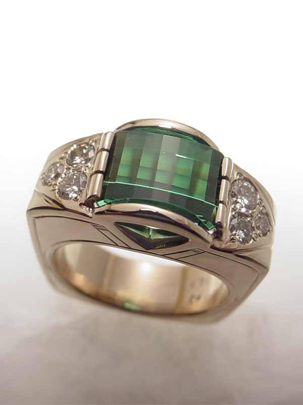 Custom Gold and Diamond ring with a Green Tourmaline in it