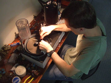 John Dyer gemstone cutter at work